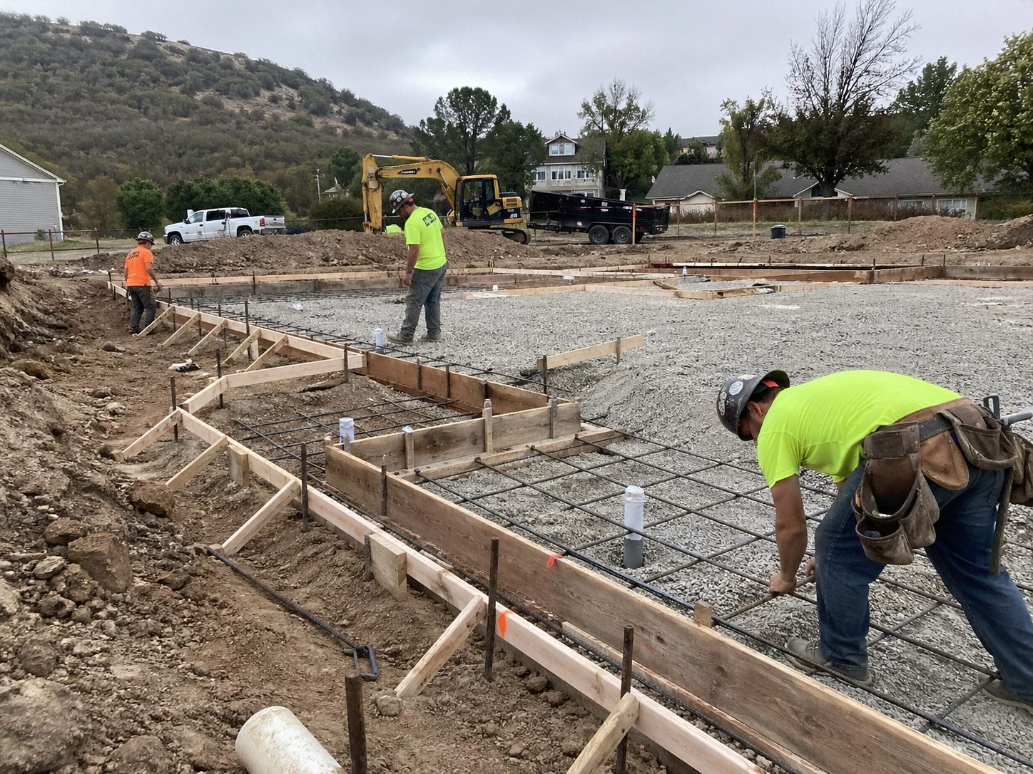 Concrete foundation and sitework preparation in Grain Valley, MO — I-70 corridor development